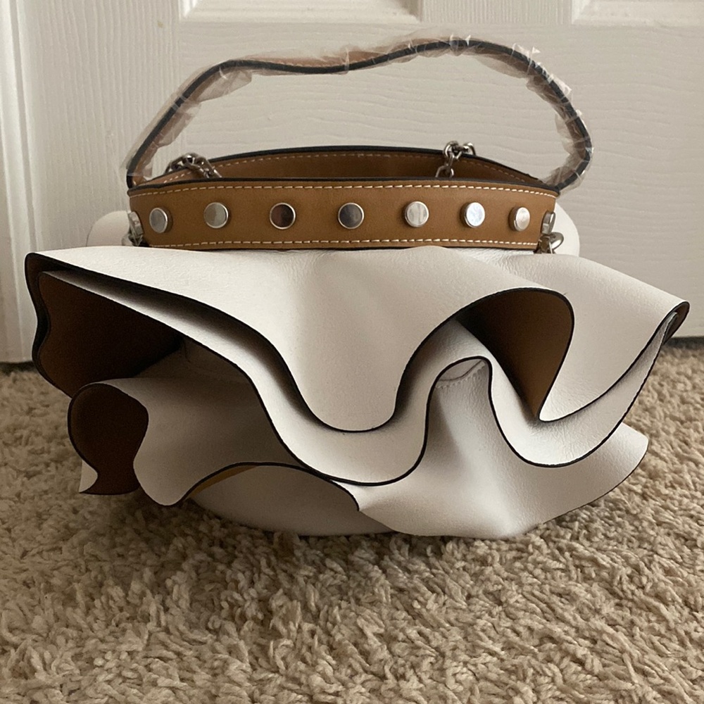 Zara white ruffle bag with chain.